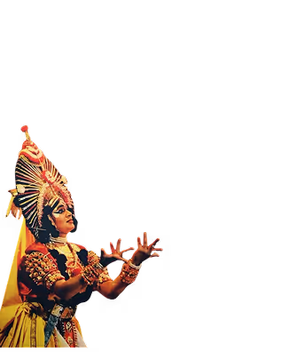 A female classical Indian dancer in vibrant traditional attire and elaborate headgear performing an expressive hand gesture against a black background.